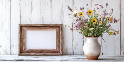 Rustic farmhouse decor with distressed frame and wildflower bouquet photo