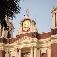 A large building with a clock on the front photo
