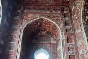 The inside of a building with intricate carvings photo