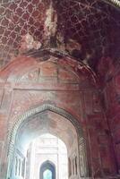The inside of a red building with intricate designs photo