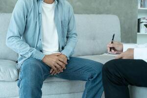 Man hold hand in front of private parts feeling discomfort and consult doctor. Venereal, testicular cancer. bladder problems, erectile dysfunction premature ejaculation. photo