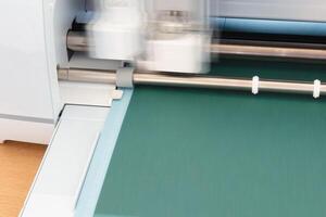 Paper cutting, ornament, design and model cut with a cutting plotter for professional activity or leisure, movement photo