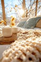 Coffee and tea on a bed with the sun shining photo