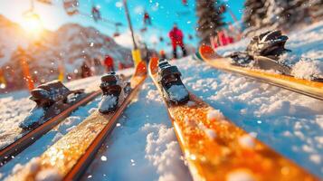 Skis are lined up on a snowy slope photo