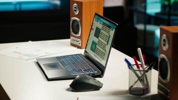 Spacious home office in a stylish apartment featuring wooden floors, a TV and decorative plants create a home office setup perfect for comfort and functionality, productivity and efficiency. video