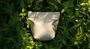 Discover the elegance of simplicity with this minimalist pouch amidst lush greenery photo