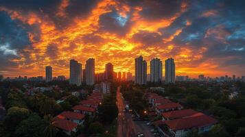 A sunset over a city with tall buildings photo