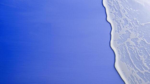 Abstract ocean wave with foam on a textured blue background creating a minimal and modern coastal aesthetic photo