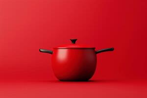 Minimalist red cooking pot with black handles on a vibrant red background photo