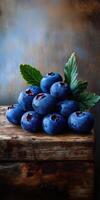 Close-Up of Fresh Blueberries on Rustic Wooden Surface photo