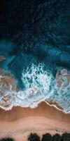 Aerial View of Ocean Waves Crashing on Sandy Beach, Perfect for Coastal, Nature, and Travel Photography Projects photo