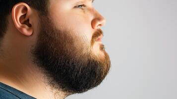 Side Profile of Bearded Man, Close-Up of Facial Hair and Grooming Style, Concept of Masculinity and Fashion photo