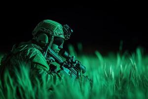 A soldier in the grass with a green light photo