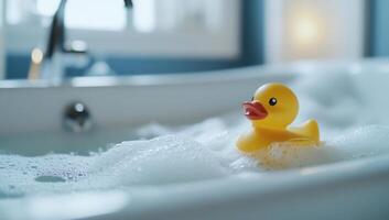 A rubber duck floating in a bathtub photo