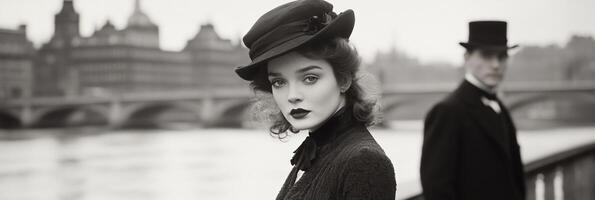A woman in a hat and a man in a suit photo