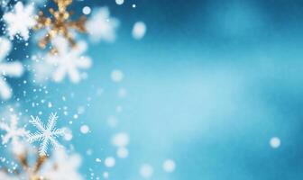 A serene winter background with snowflakes and a soft blue gradient. photo