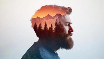 Double exposure of a bearded man with trees and mountains in the background photo