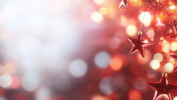 A festive background with red stars and sparkling bokeh lights. photo