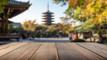 An empty table in front of a pagoda photo