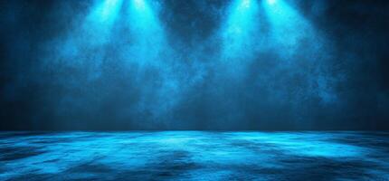 A blue-lit empty stage with a textured floor, ready for performance. photo