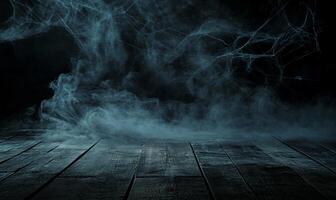A dark, foggy scene with spider webs, evoking a spooky atmosphere. photo
