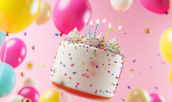 A festive cake with candles surrounded by colorful balloons. photo