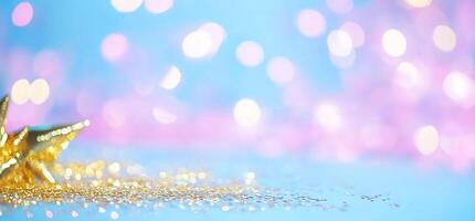 A sparkling star on a colorful background with bokeh lights. photo