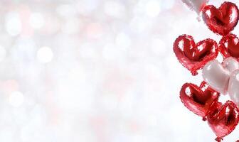 A festive display of red hearts against a soft, blurred background. photo