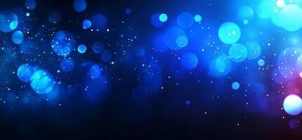Abstract blue bokeh background with soft glowing lights. photo