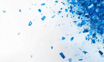 Abstract blue fragments dispersing against a light background. photo