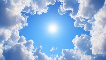 A serene view of bright blue sky framed by fluffy white clouds. photo