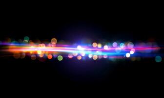 Abstract light streaks and bokeh effects on a dark background. photo