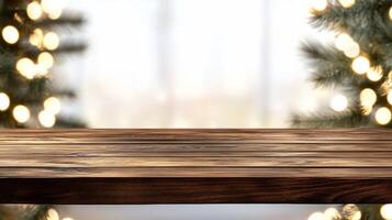 Christmas tree and wooden table in front of blurred background photo