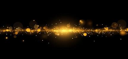 A shimmering golden light effect with bokeh on a black background. photo