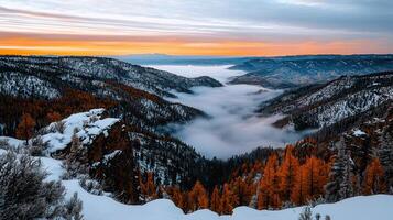 Stunning Sunrise Over Snowy Mountains and Fog Filled Valley Winter Landscape photo