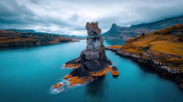 Majestic Coastal Rock Formation in Turquoise Sea Dramatic Landscape Photography photo