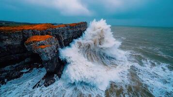 Dramatic Ocean Waves Crashing Against Rugged Coastal Cliffs photo
