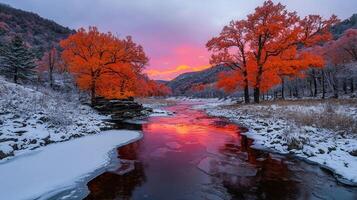 Stunning Autumn Sunset over Snowy River with Vibrant Red Trees photo