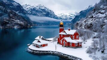 Scenic Winter Landscape Red Lighthouse Snowy Mountains and Fjord photo