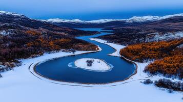 Stunning Aerial View of Serpentine River Winding Through Snowy Winter Landscape Frozen Island photo