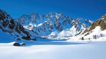 Majestic Winter Mountain Landscape Snow Covered Peaks and Serene Valley photo