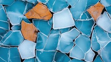 Abstract Winter Ice Texture Broken Blue and Orange Ice Fragments photo