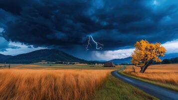 Dramatic Lightning Storm over Rural Landscape with Golden Field and Autumn Tree photo