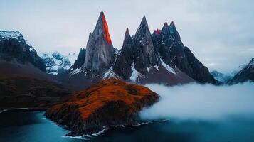 Dramatic Coastal Mountain Range with Autumnal Island and Misty Fjord Patagonia photo