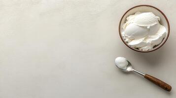 Creamy Vanilla Ice Cream in Bowl with Spoon Overhead Shot Food Photography photo