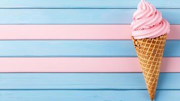 Delicious Pink Soft Serve Ice Cream Cone on Pastel Blue and Pink Wooden Background photo