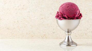 Delicious Scoop of Berry Ice Cream in Elegant Silver Bowl on Marble Background photo