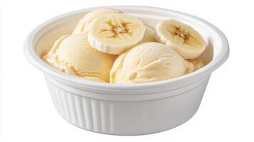 Creamy Vanilla Ice Cream with Fresh Banana Slices in a White Bowl photo