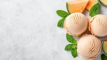 Delicious Cantaloupe Ice Cream Scoops with Fresh Mint and Melon Slices photo