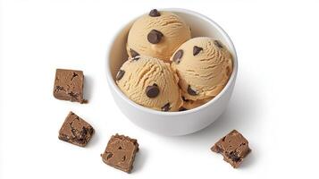 Delicious Chocolate Chip Ice Cream Scoops in Bowl with Brownie Pieces photo